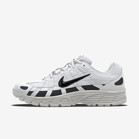 Black and white leather nike shoes hot sale